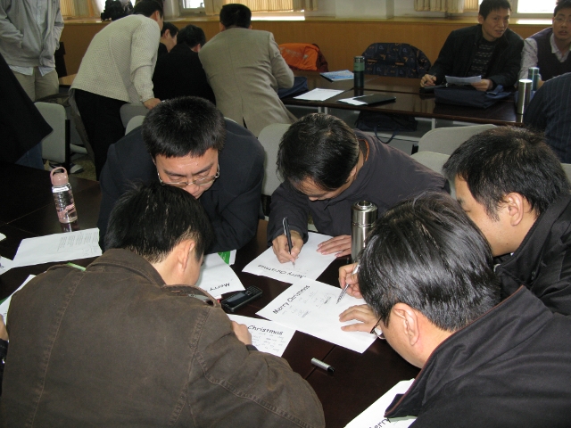 These are my Sinopec students working on one of the Christmas games. This game was hilarious!