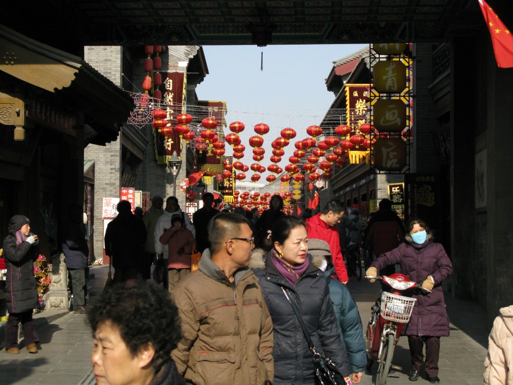 Another part of the market. Notice the red lanterns. This is a popular and significant decoration for the festival. I'm not sure why. I should research.