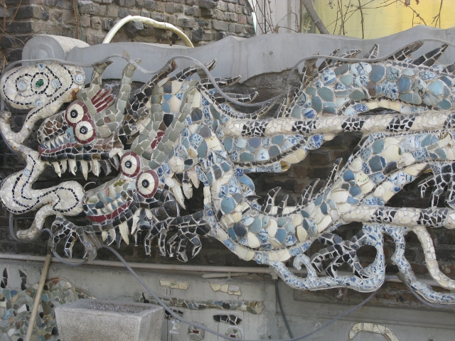 This was a crazy Chinese restaurant that we walked by.  There were many 'sculptures' like this made out of chunks of pottery. The dragons were pretty cool!